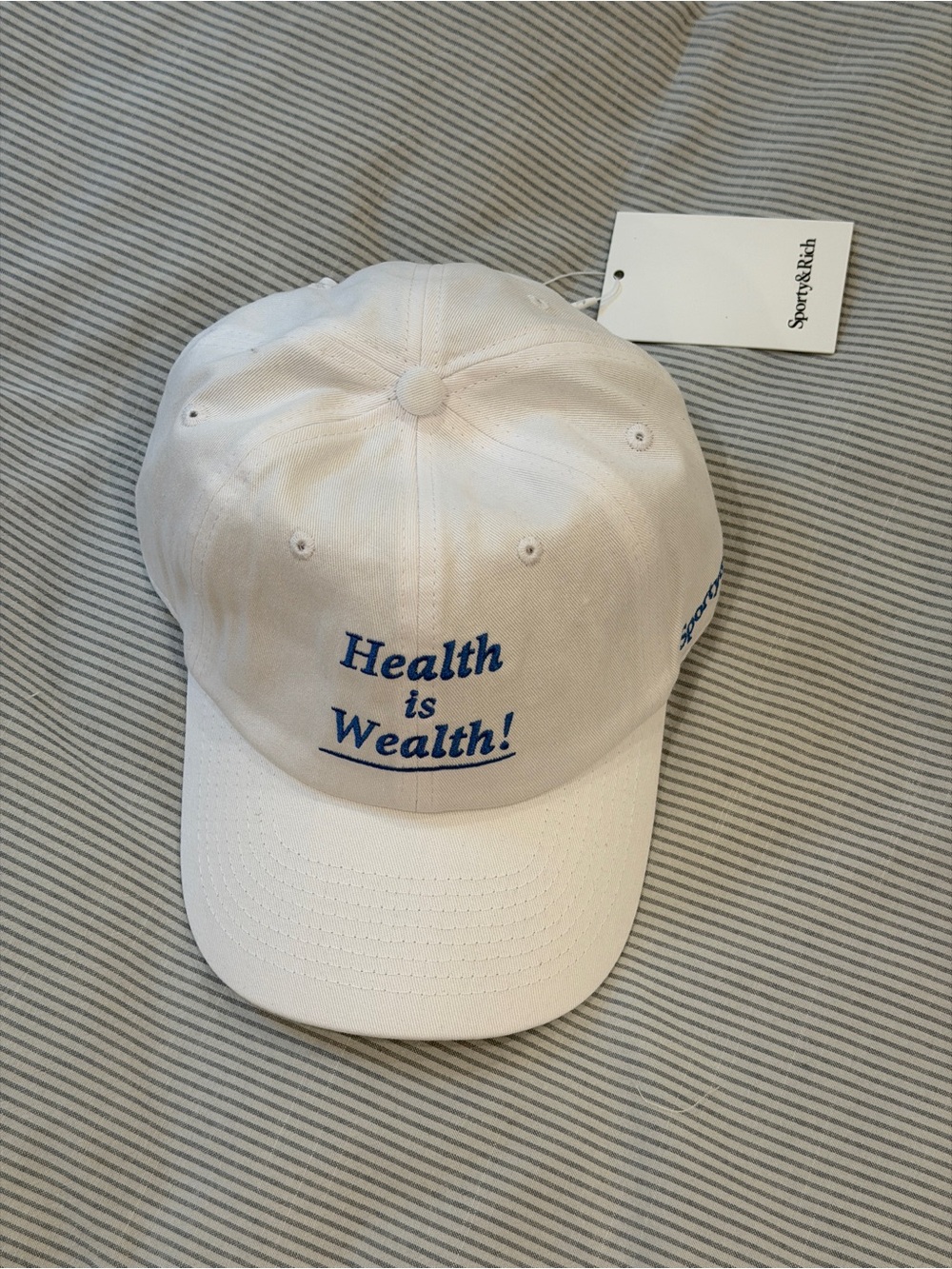Sporty&Rich 'Health is Wealth!' White Baseball Cap